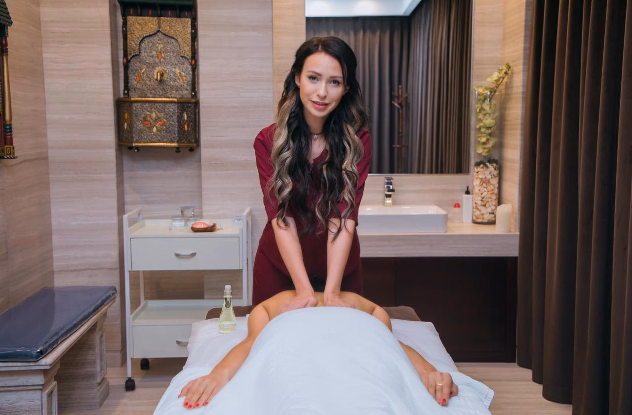 How do I contact a professional massage spa in Dubai?