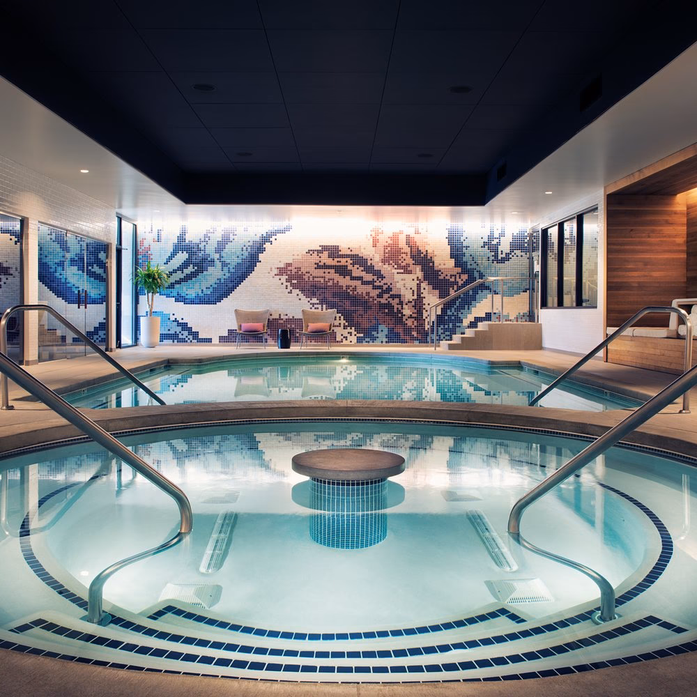 How do I get a discount on massage therapy services in Kansas City?