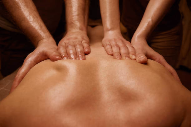 Quelle est l'origine du massage à quatre mains ?
