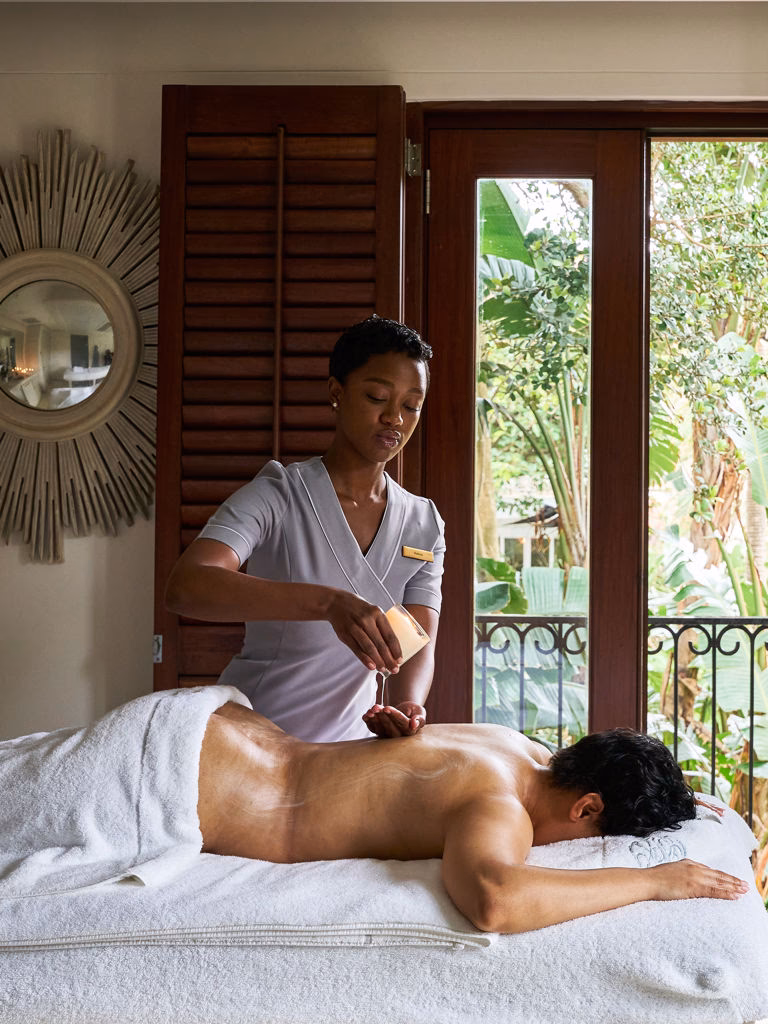 What is a hot herbal ball spa massage?