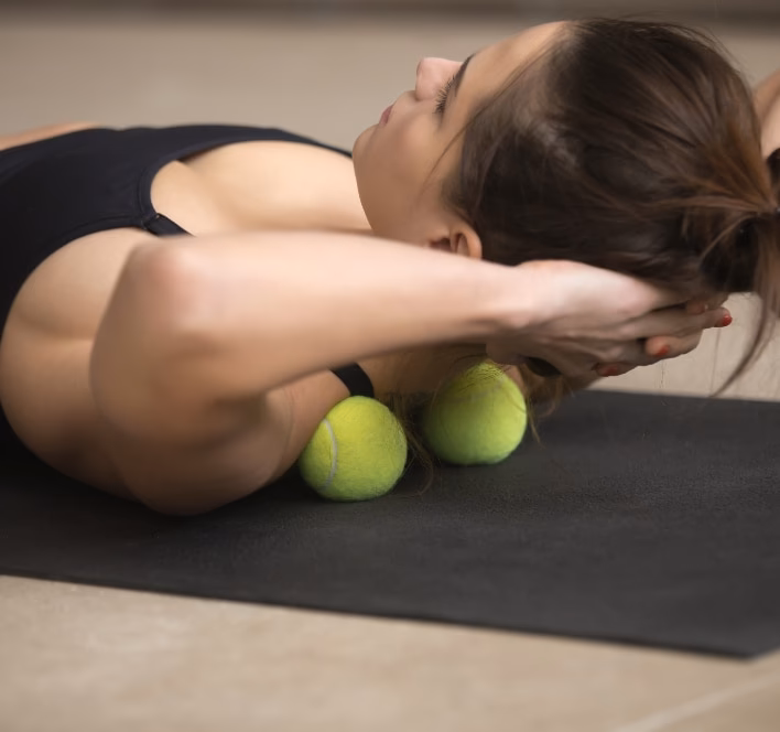 What are the benefits of tennis ball massage?