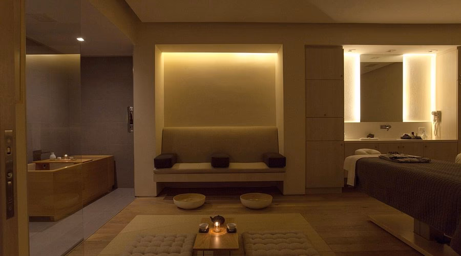 Why is Tomoko a good massage therapist?